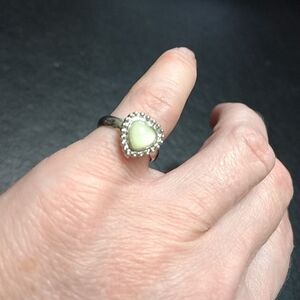 Silver tone adjustable cream heart ring